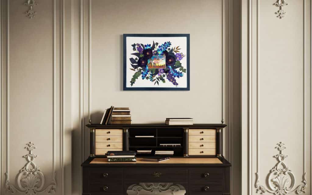 Framed artwork featuring a vibrant floral arrangement, symbolizing wedding bouquets, displayed on a stylish desk in an elegant interior setting.